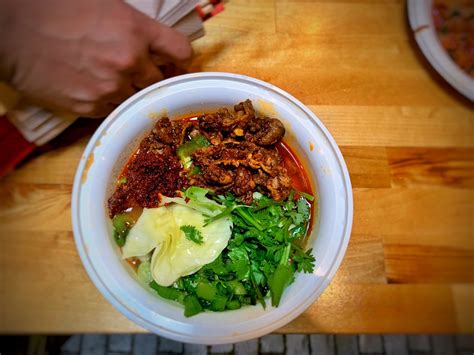  Hand-Ripped Noodle Soup With Spicy Lamb - Will this Flavorful Dish Send Your Taste Buds on a Tangy Adventure?